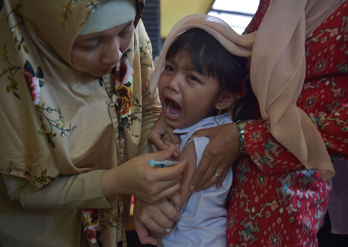 Indonesia vaccinates millions to halt deadly diphtheria outbreak
